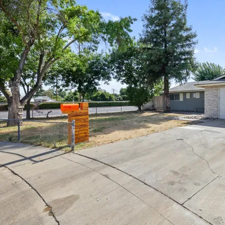 Buy this 3 bed house on 1935 South Roxsan Court in Visalia, CA 93292