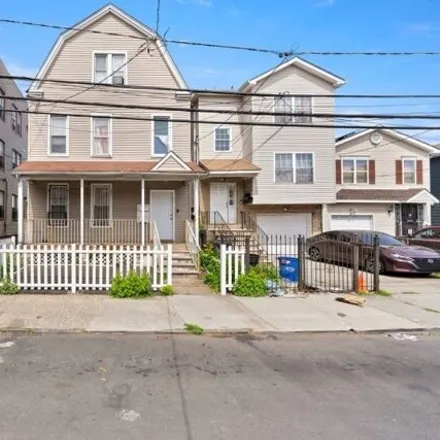 Buy this 6 bed house on 31 Hobson Street in Newark, NJ 07112