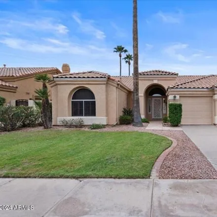 Buy this 4 bed house on 1821 West Lantana Drive in Chandler, AZ 85248