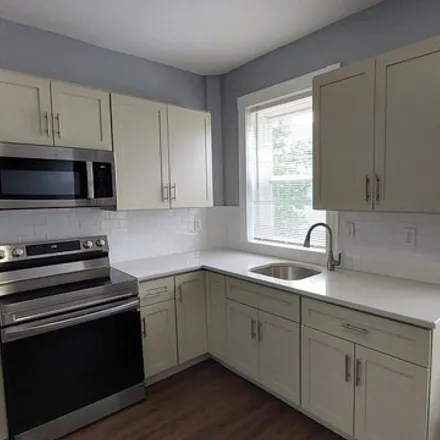 Rent this 4 bed apartment on 6 Wabeno Street in Boston, MA 02119