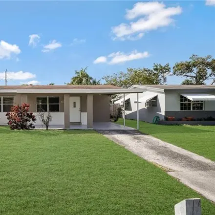 Buy this 3 bed house on 3843 Northeast 16th Terrace in North Pompano Beach, Pompano Beach