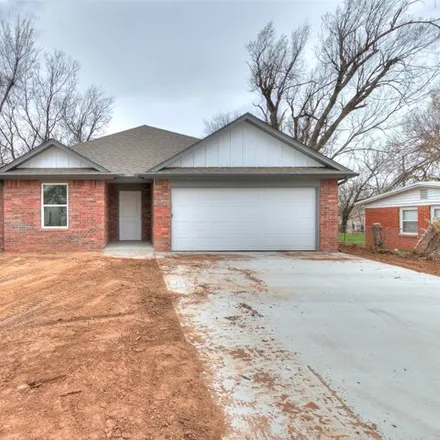 Buy this 4 bed house on 1965 Elm Drive in Del City, OK 73115