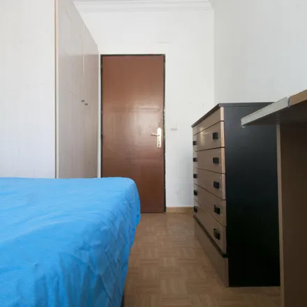 Rent this 9 bed room on Madrid in Calle de Almonacid, 6