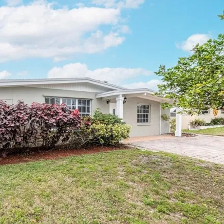 Buy this 3 bed house on 547 Ivy Avenue in North Palm Beach, FL 33410