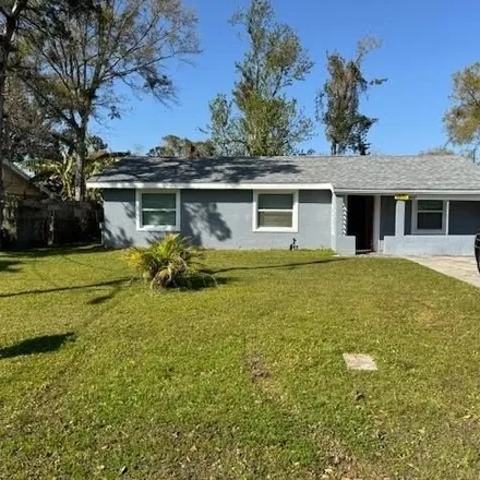 Rent this 4 bed house on 2873 Harwood Street in Orlando, FL 32805