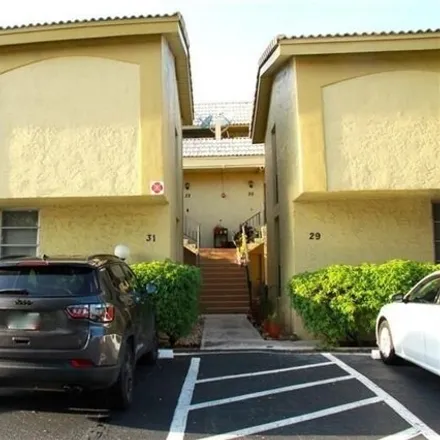Buy this 2 bed townhouse on 8357 West Sample Road in Coral Springs, FL 33065