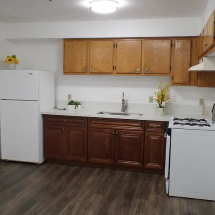Rent this 3 bed apartment on 5271 Huntington Dr. North
