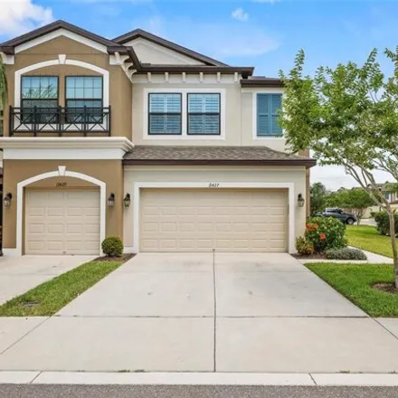Buy this 3 bed townhouse on 11401 Crowned Sparrow Lane in Citrus Park, FL 33626