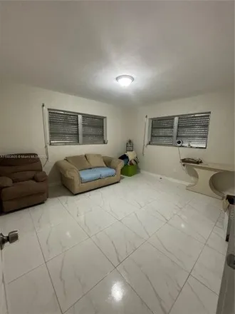 Buy this 4 bed house on 1921 Northwest 55th Street in Brownsville, Miami