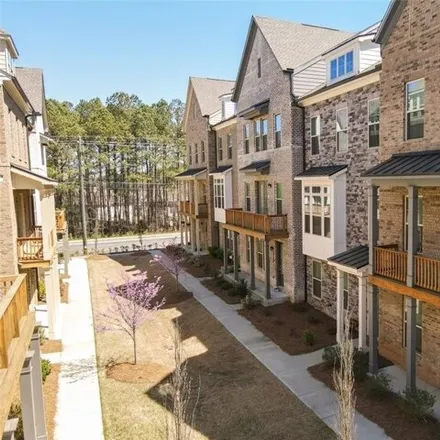 Buy this 3 bed townhouse on unnamed road in Peachtree Corners, GA 30071