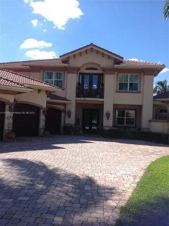 Buy this 5 bed house on 6500 Northwest 93rd Drive in Parkland, FL 33067