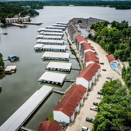 Buy this 3 bed condo on 99 Lighthouse Landing in Lake Ozark, MO 65049