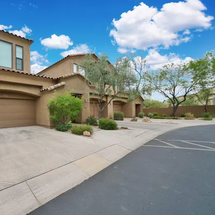Rent this 3 bed townhouse on 16600 North Thompson Peak Parkway in Scottsdale, AZ 85260