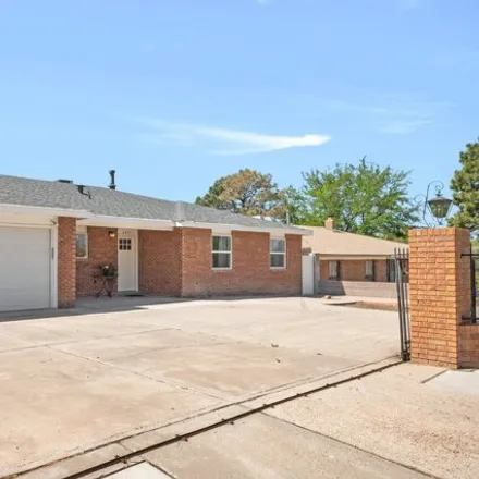 Buy this 3 bed house on Cathy Avenue Northeast in Albuquerque, NM 87109