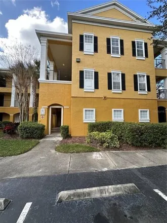 Rent this 2 bed condo on Tradition Parkway in Orlando, FL 32811