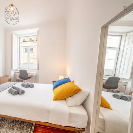 Rent this 4 bed room on Travessa do Pinheiro 14 in 1200-747 Lisbon, Portugal