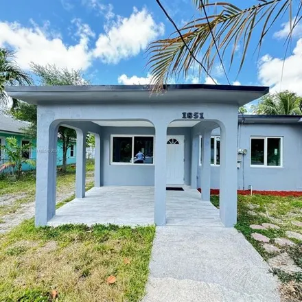 Buy this 3 bed house on 1851 Northwest 64th Street in Liberty Square, Miami