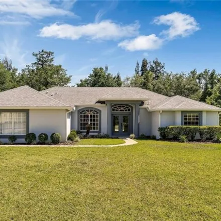 Buy this 4 bed house on 15038 Willow Lane in Tavares, FL 32778