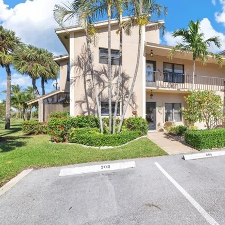 Rent this 2 bed condo on 1398 Clubhouse Circle in Jupiter, FL 33477