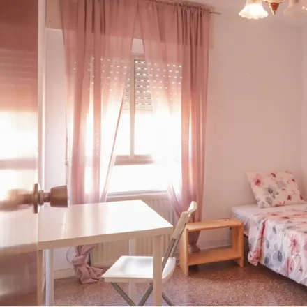 Rent this 4 bed room on Calle del Cristo de la Victoria in 28026 Madrid, Spain