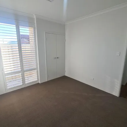 Rent this 4 bed apartment on Viridian Boulevard in Eglinton WA 6038, Australia
