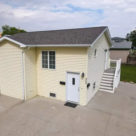 Buy this 4 bed house on 880 7th Street Northwest in Minot, ND 58703