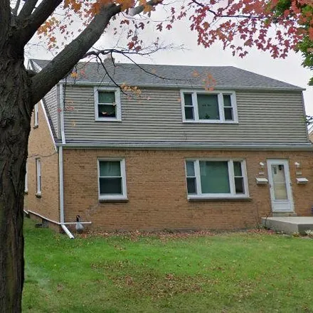 Buy this 4 bed duplex on 3927 South 1st Place in Milwaukee, WI 53207