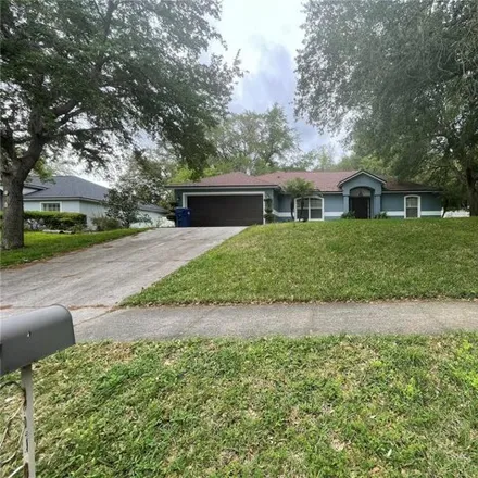 Rent this 3 bed house on 1313 Oak Valley Boulevard in Minneola, FL 34715