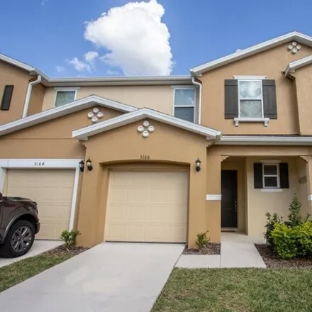 Rent this 4 bed townhouse on 5166 Adelaide Dr in Kissimmee, Florida
