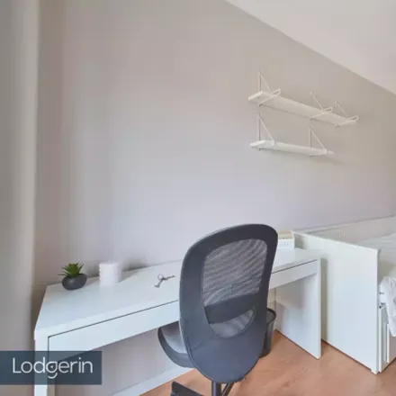 Rent this studio room on Avenida São João de Deus in 1000-009 Lisbon, Portugal