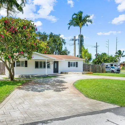 Buy this 3 bed house on 1011 Southwest 28th Avenue in Chapel Hill, Boynton Beach