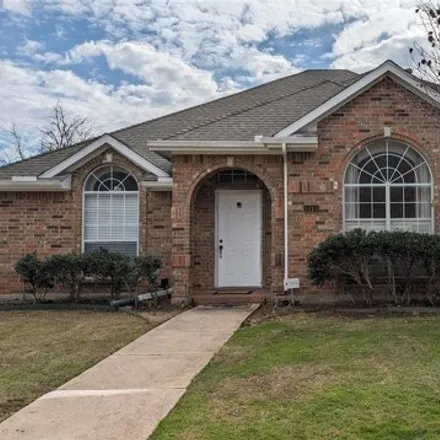 Rent this 4 bed house on 1115 Cambridge Drive in Carrollton, TX 75007