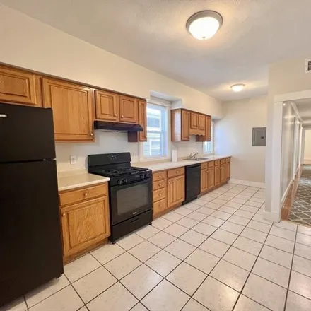 Rent this 4 bed apartment on 21 Macarthur St Apt 2 in Somerville, Massachusetts