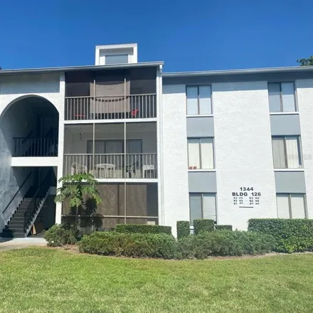 Buy this 2 bed condo on 1348 Pine Ridge Circle East in East Lake, FL 34688