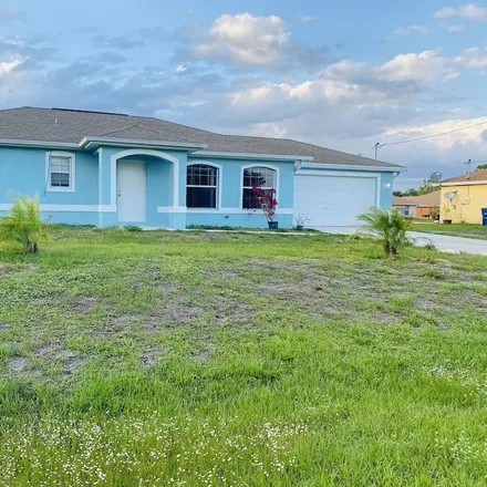 Buy this 4 bed house on 2616 66th Street W in Lehigh Acres, FL 33971
