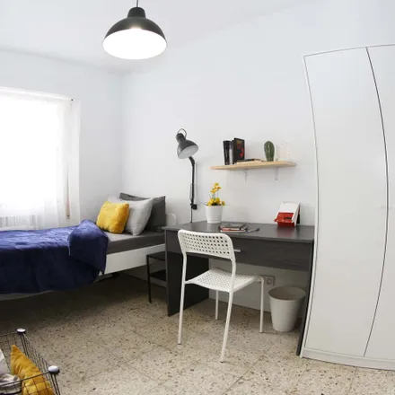 Rent this 5 bed room on Calle de Camarena in 229, 28047 Madrid