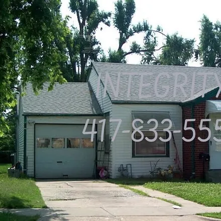 Rent this 4 bed house on 2110 N Rogers Ave
