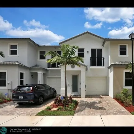 Buy this 3 bed townhouse on unnamed road in Coconut Creek, FL