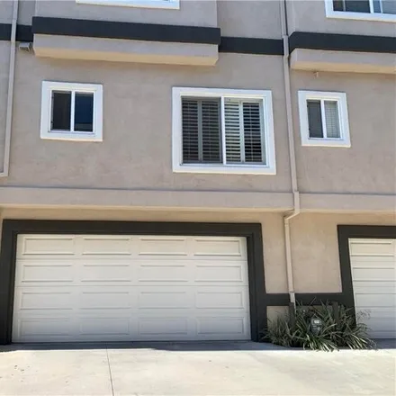 Rent this 2 bed townhouse on 11538 215th Street in Lakewood, CA 90715