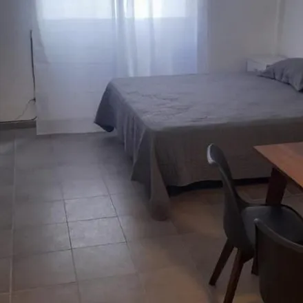 Rent this studio apartment on Meeting point FreeWalkingTour (orange shirt) in Serrano, Palermo