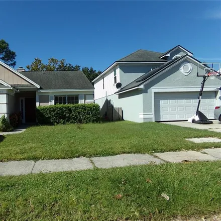 Rent this 3 bed house on 1041 Kelsey Avenue in Alafaya Woods, Oviedo