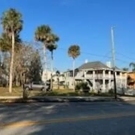 Buy this 4 bed house on 114 Live Oak Street in New Smyrna Beach, FL 32168