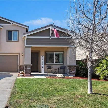 Rent this 4 bed house on 23856 Cheyenne Canyon Drive in Menifee, CA 92587