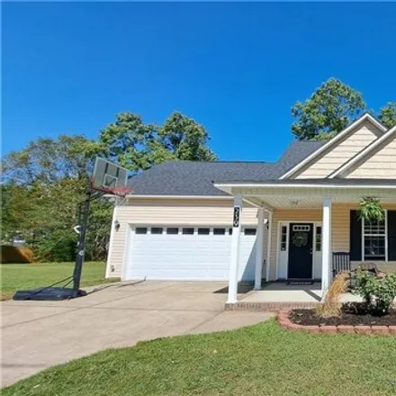 Rent this 3 bed house on 239 Apache Trl in Sanford, North Carolina