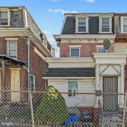 Buy this 8 bed townhouse on 36 West Apsley Street in Philadelphia, PA 19144