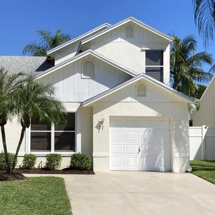 Buy this 3 bed house on 77 Tara Lakes Drive West in Boynton Beach, FL 33436