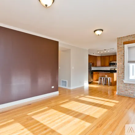 Rent this 2 bed condo on 3040 W Diversey Ave