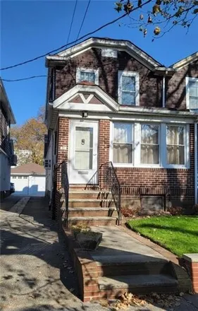 Buy this 3 bed duplex on 71 78th Street in New York, NY 11209