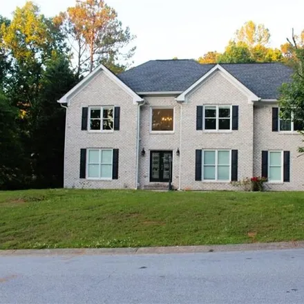 Buy this 5 bed house on 1580 Meadow Oak Dr in Snellville, Georgia