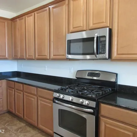 Rent this 5 bed apartment on 12689 North Greenberry Drive in Marana, AZ 85653